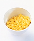 Sweetcorn kernels in a small white bowl