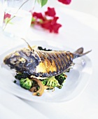 Sea bream with peanut sauce and green pepper