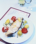 Halibut with Pommery mustard sauce, leeks & stewed tomatoes