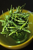 Green chillies in a glass