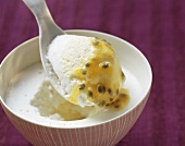 Passion fruit and coconut cream in a small bowl