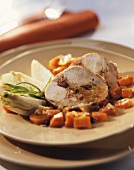 Stuffed saddle of rabbit with fennel and carrots