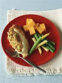 Stuffed chicken breast with carrots and beans