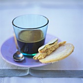 An espresso with biscuits