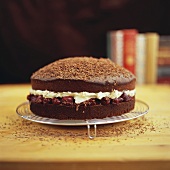 Chocolate cherry cake on a cake rack