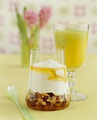 Fruit muesli with yoghurt and honey and fruit cocktail