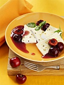 Pepper Camembert with cherry sauce