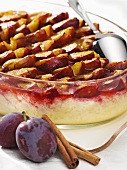 Baked rice pudding with damsons and raisins