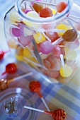 Assorted lollipops in a jar
