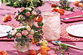 Table decoration of asters, Boston ivy & Chinese lanterns