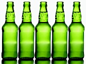 Five green beer bottles