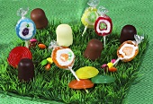 Assorted sweets in grass
