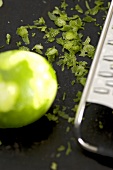 Lime, lime peel and grater