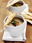 Creamed mushroom soup in two soup cups
