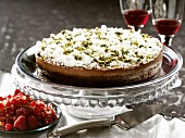 Chocolate mousse cake with pistachios and meringue