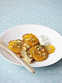 Toasted white bread topped with candied orange slices