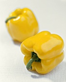 Two yellow peppers