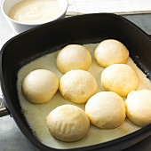 Dampfnudeln (steamed dumplings) in pan (uncooked)