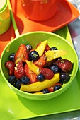 Fruit salad: mango, strawberries and blueberries