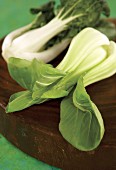 Pak choi on a wooden board