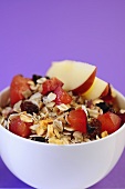 Muesli with plums and apples