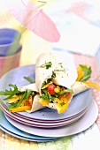 Goat's cheese wrap with cherry tomatoes, pepper and rocket