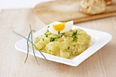 Potato salad with egg and chives