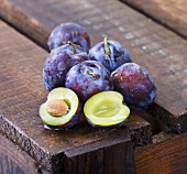 Plums on a wooden crate