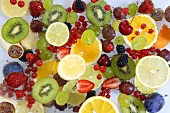 Various types of fruit in water, seen from above