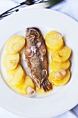 Smoked herring with onions and potatoes