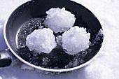 Three snowballs in a frying pan