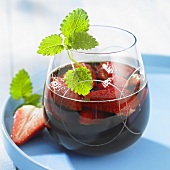 Red wine puch with strawberries and mint