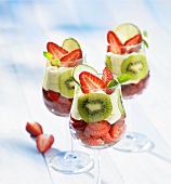 Strawberries with cream and kiwis