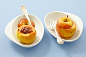Two baked apples with rose preserve