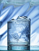 A glass of water with ice cubes