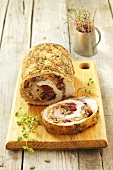 Pork roulade stuffed with mushrooms and dried cranberries