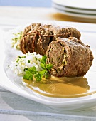 Beef roulade stuffed with ham and basil
