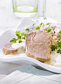 Poached shoulder of lamb in a mascarpone cream