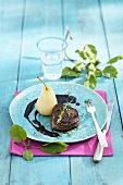 Beef fillet steak with bottled pear and elderberry sauce