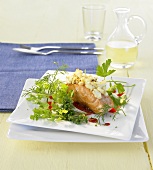 Baked salmon fillet with goat's cheese and herbs