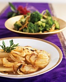 Potato and onion gratin with broccoli