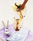 Vanilla ice cream sundae with banana and chocolate sauce