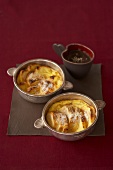 Sweet bread & butter puddings with chocolate red wine sauce