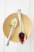 Apple and marjoram sauce and Cumberland sauce on spoons