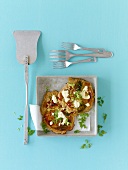 Two vegetable pancakes with feta and chervil
