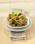 Sesame-coated tuna with green asparagus