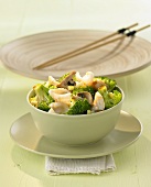 Fried squid with broccoli and mushrooms