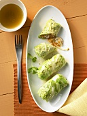 Three Chinese cabbage leaves stuffed with vegetables