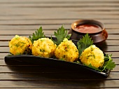 Four pasta balls with dip