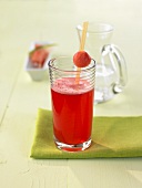 Pomegranate and watermelon drink with froth